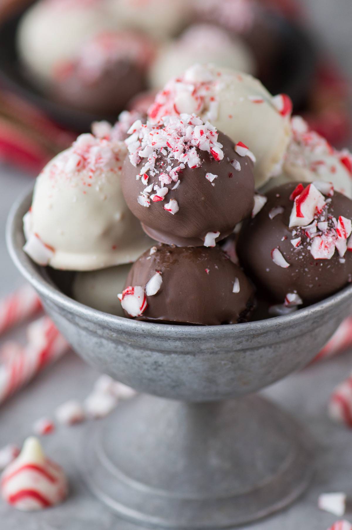 chocolate and white chocolate peppermint oreo balls in metal bowl