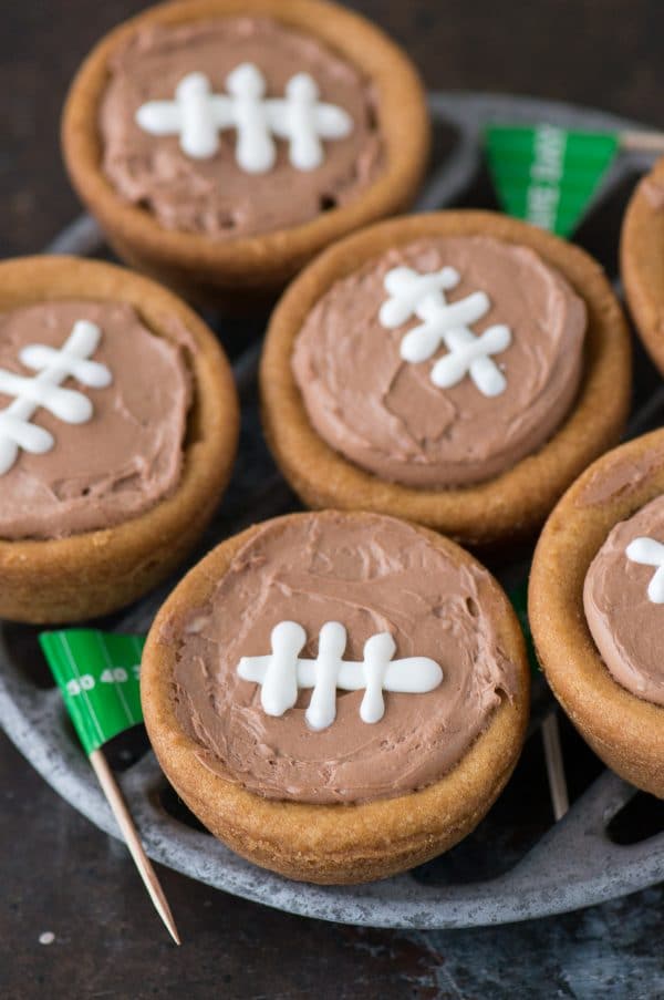 cheesecake sugar cookie football cups on a serving plate