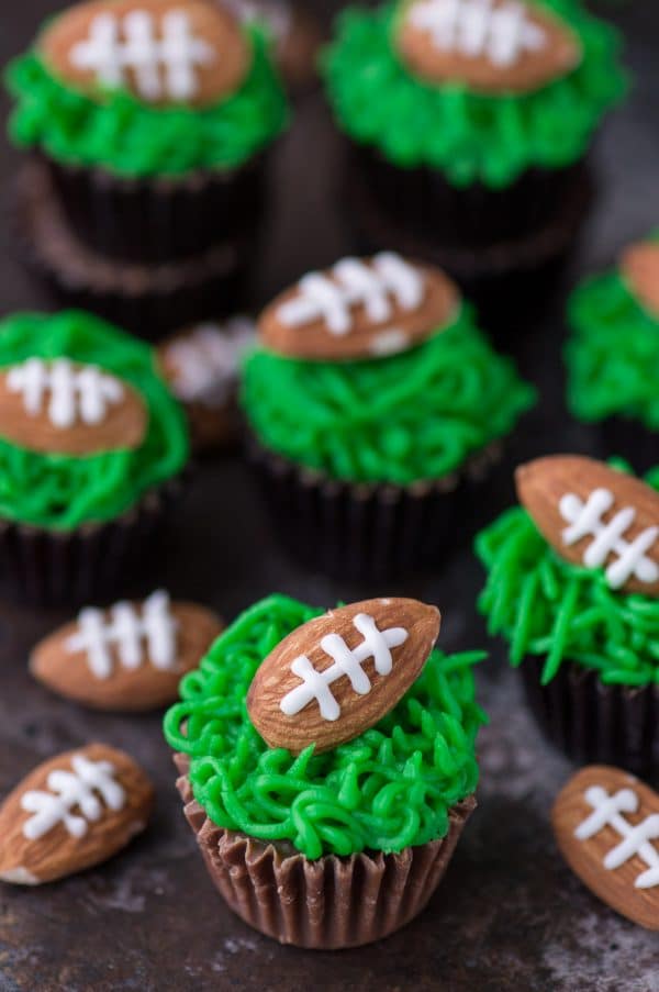 Reese's Peanut Butter Football Cups with Green Grass Frosting