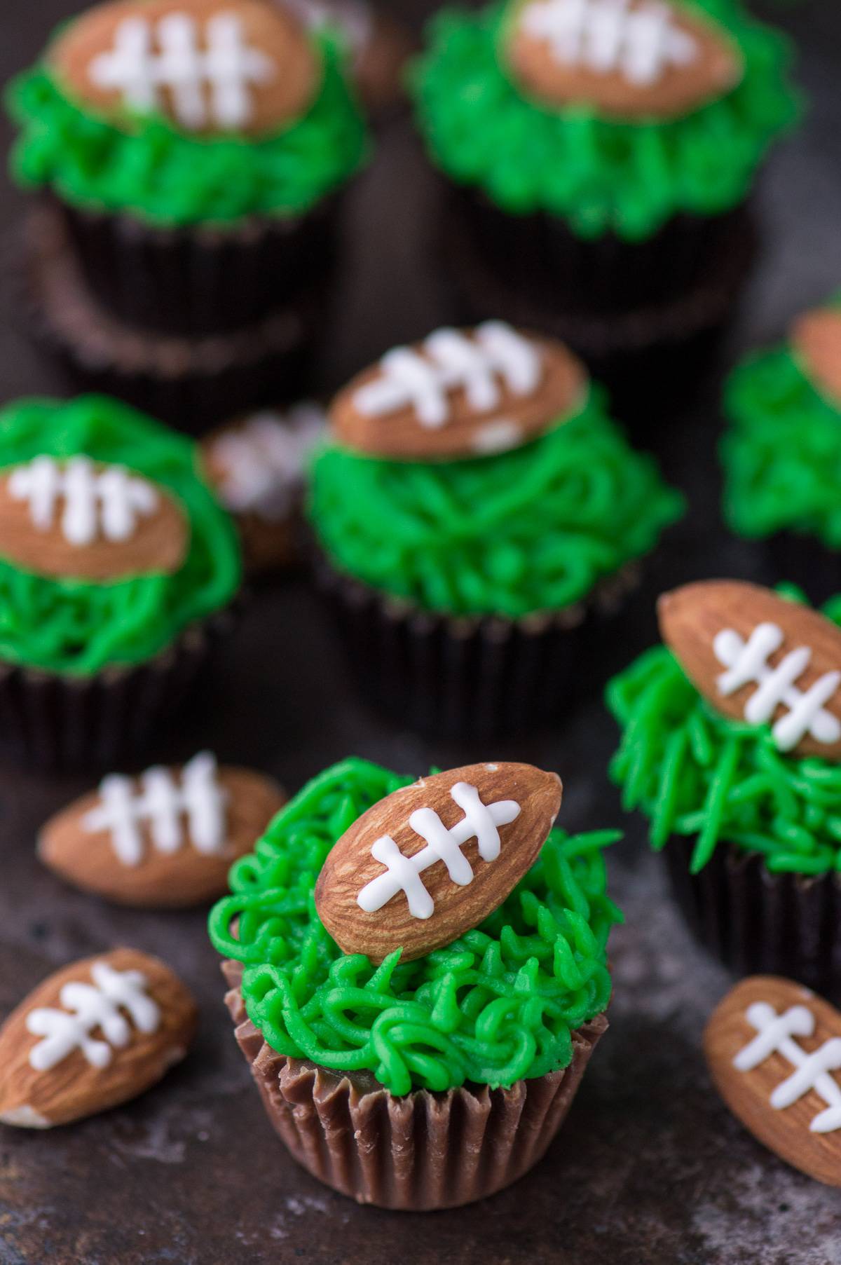 Reese's Peanut Butter Football Cups with Green Grass Frosting
