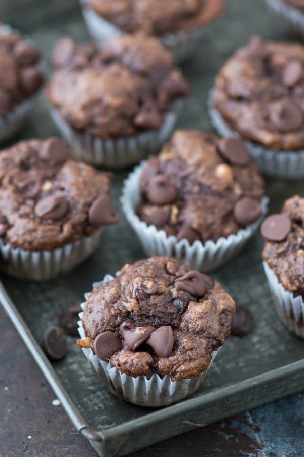 These are the BEST healthier chocolate mini muffins with no granulated sugar, butter or oil in the recipe! Make healthier chocolate muffins with bananas, greek yogurt, and honey. 