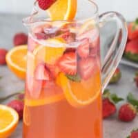 Fruity and refreshing homemade strawberry sangria! Gather up the juiciest strawberries, white wine, and a few other ingredients because you’ll want to make this recipe whenever warm weather hits!