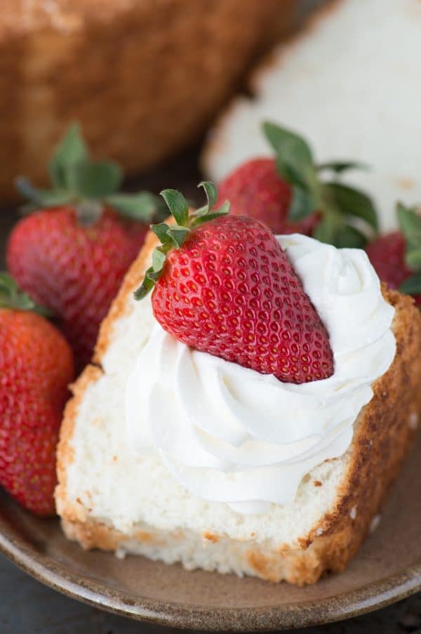 100% homemade angel food cake! This is the recipe that everyone will ask you for! This recipe shows you how to use all purpose flour instead of cake flour, and you can easily make it gluten free!