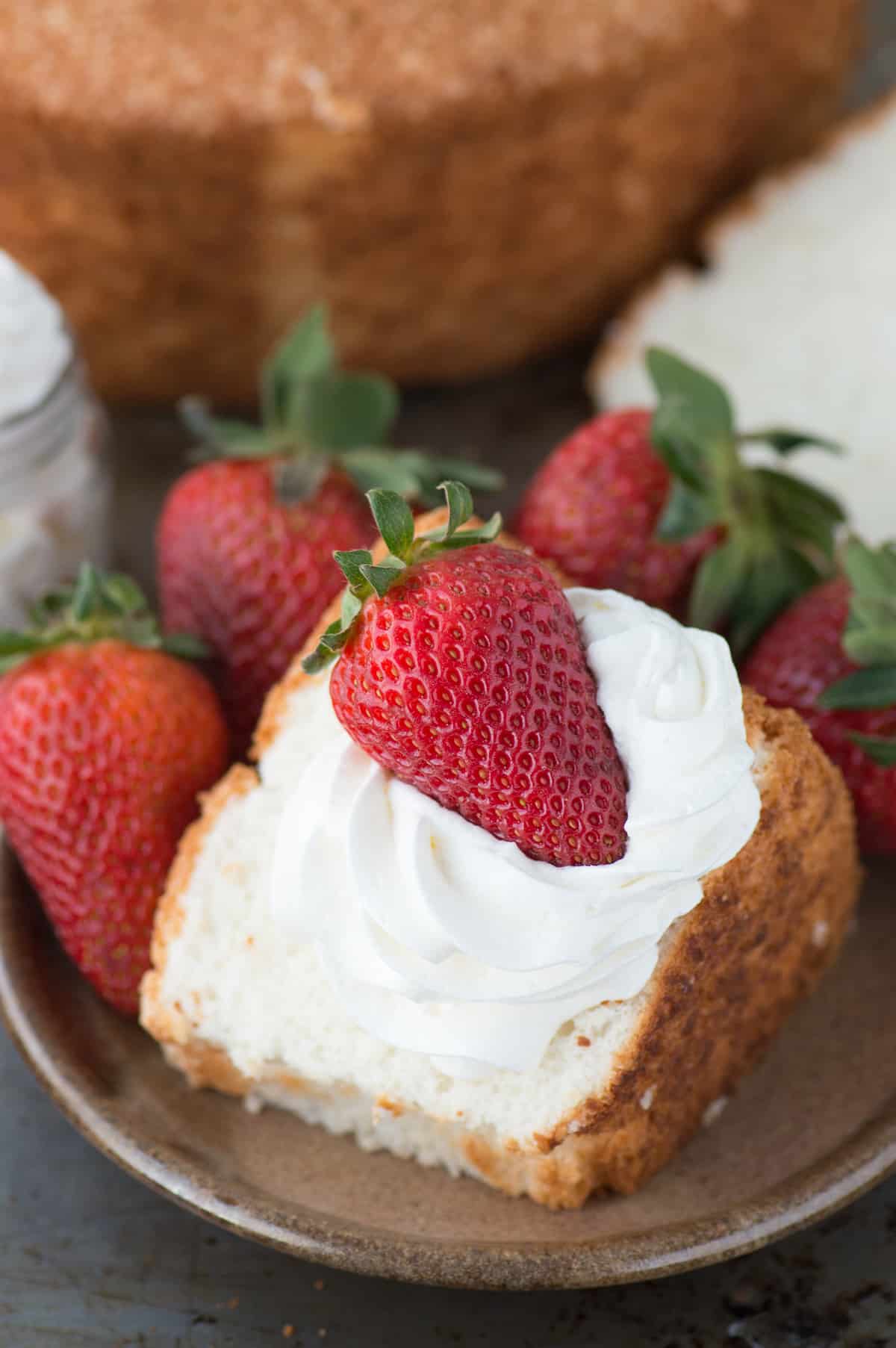 100% homemade angel food cake! This is the recipe that everyone will ask you for! This recipe shows you how to use all purpose flour instead of cake flour, and you can easily make it gluten free!