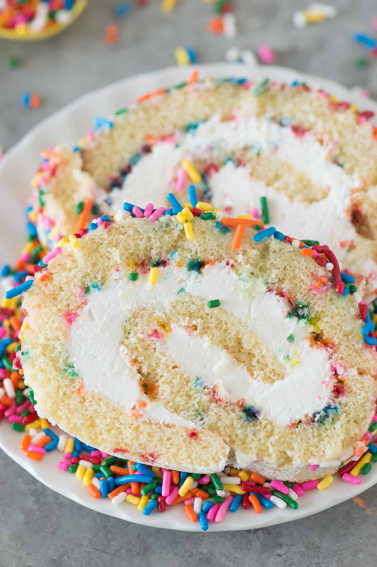 The ULTIMATE funfetti cake roll! A vanilla cake paired with a cream cheese frosting. Add as many sprinkles as you like!