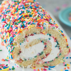The ULTIMATE funfetti cake roll! A vanilla cake paired with a cream cheese frosting. Add as many sprinkles as you like!
