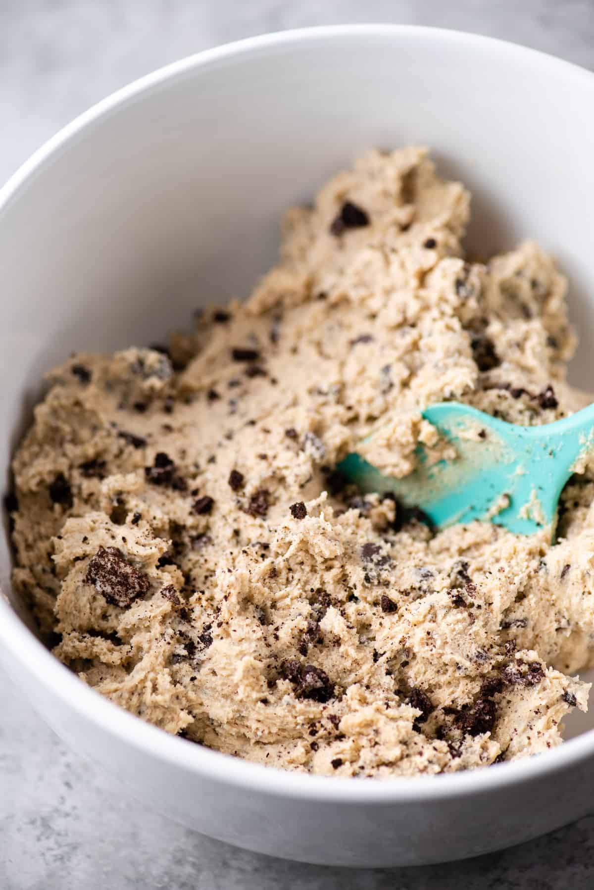 cookies and cream cookie dough batter in white bowl