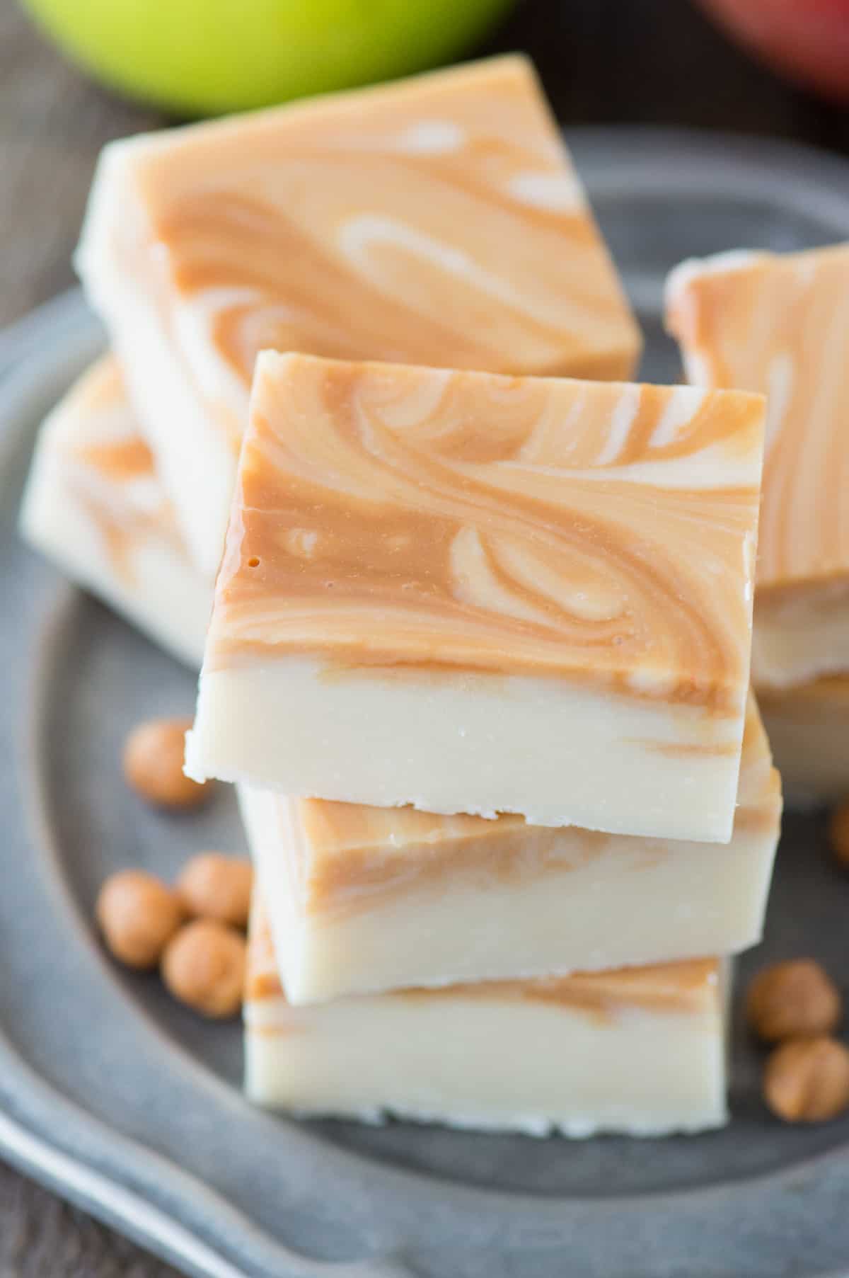 pieces of caramel apple fudge on metal plate