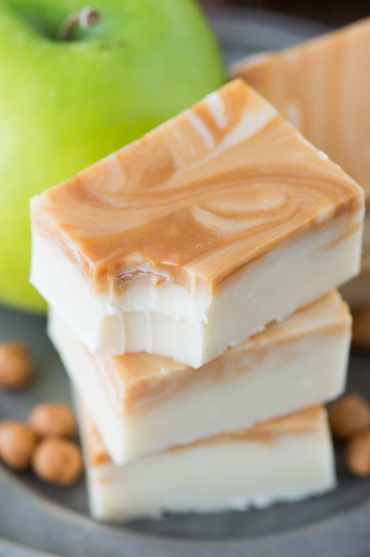 caramel apple fudge with bite removed on one piece with text overlay