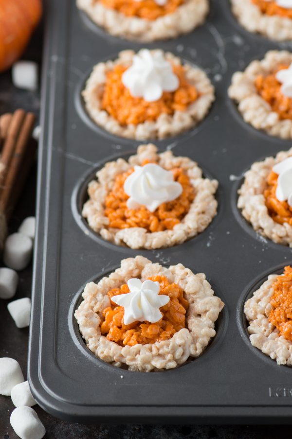 Mini pumpkin pie rice krispie treats are perfect for the fall and thanksgiving! Kids and adults devour these!