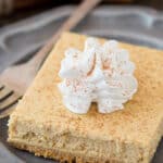 Easy to follow recipe for pumpkin cheesecake bars that are made in a 9x13 inch pan!