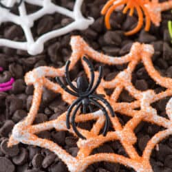 An easy Halloween treat - edible spider web meringues! Display these spider webs with plastic spider rings for a spooky look!