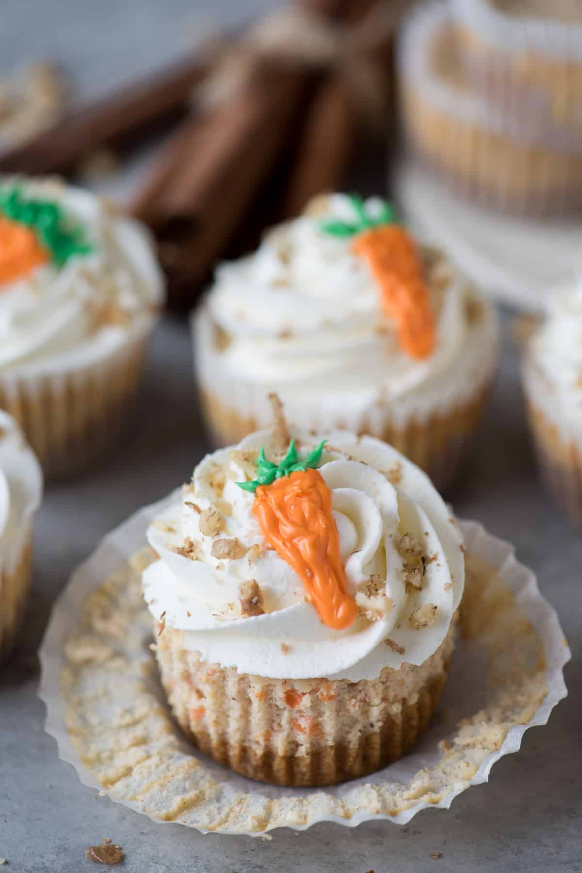 mini carrot cheesecake with frosting carrot on top