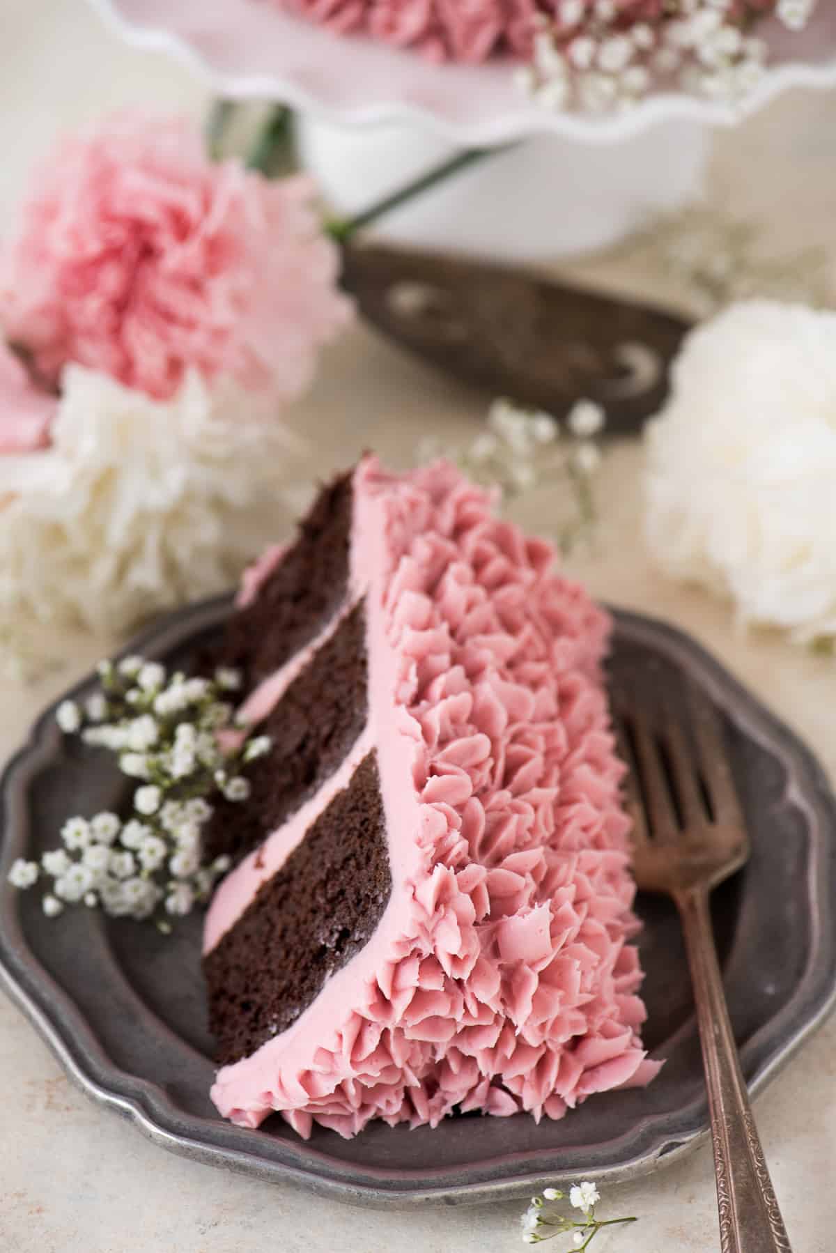 Made from scratch raspberry chocolate cake! Features 3 layers of classic chocolate cake with a raspberry jam buttercream.