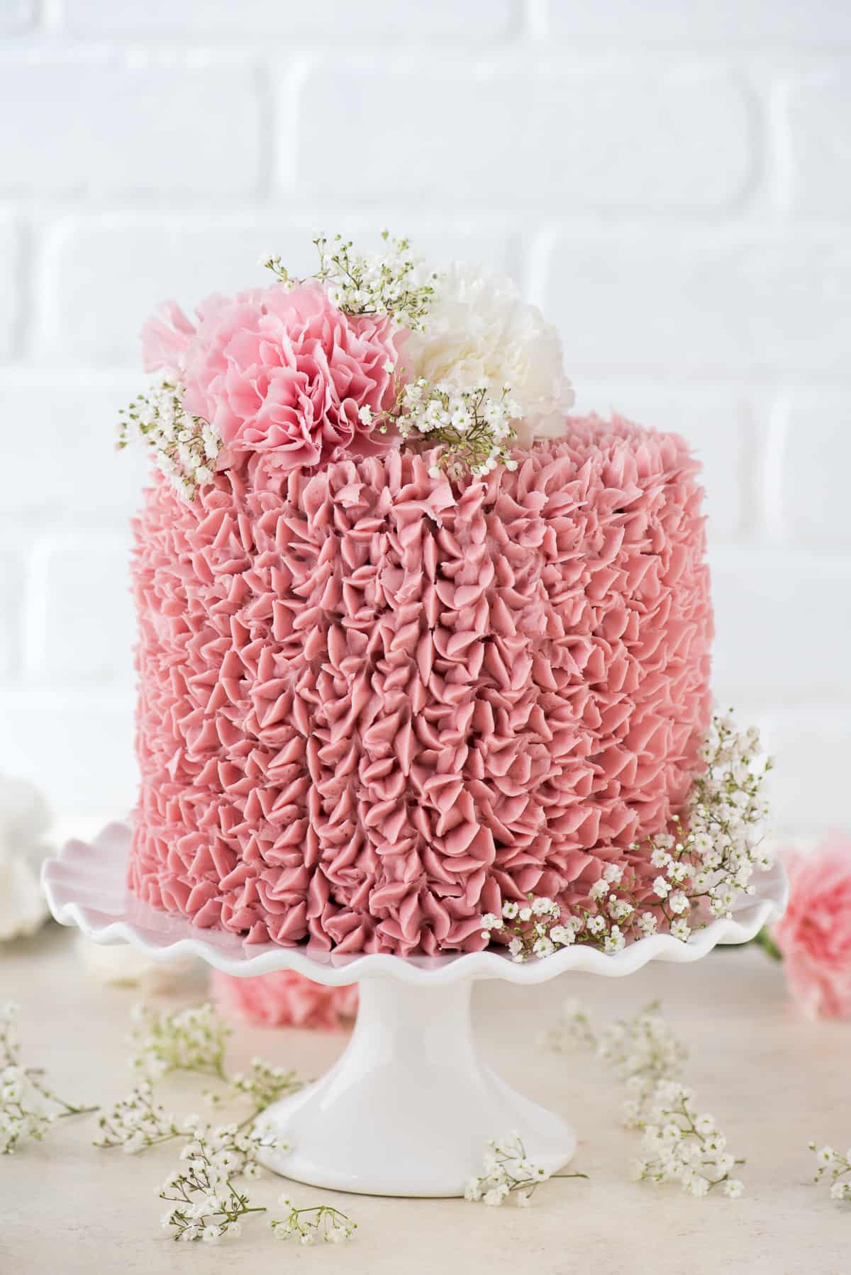 Made from scratch raspberry chocolate cake! Features 3 layers of classic chocolate cake with a raspberry jam buttercream.