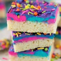 The best sugar cookie bars to serve at a party! We love making the tri-color frosting, it gets lots of rave reviews!