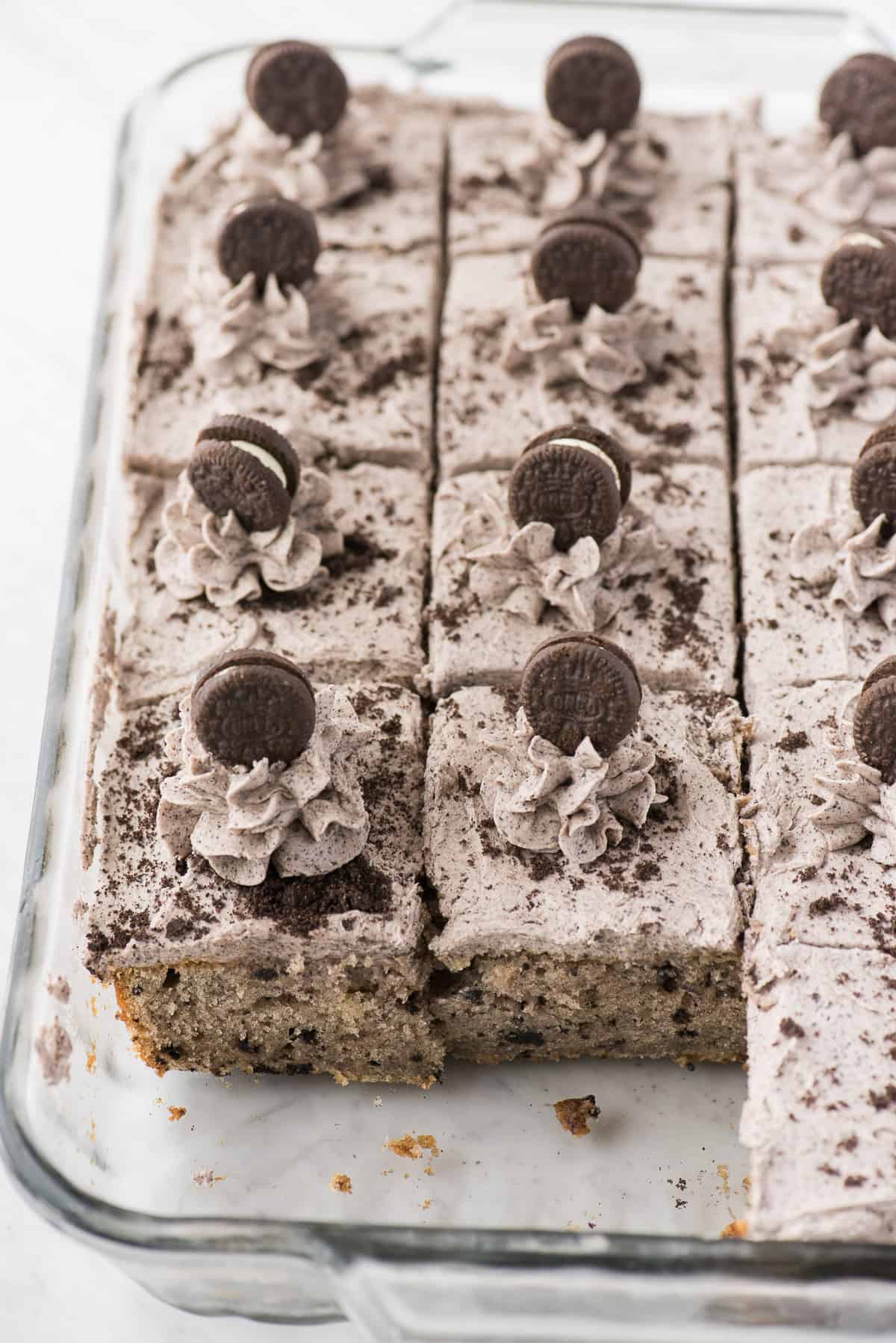 oreo cake cut into pieces in glass 9x13 inch pan