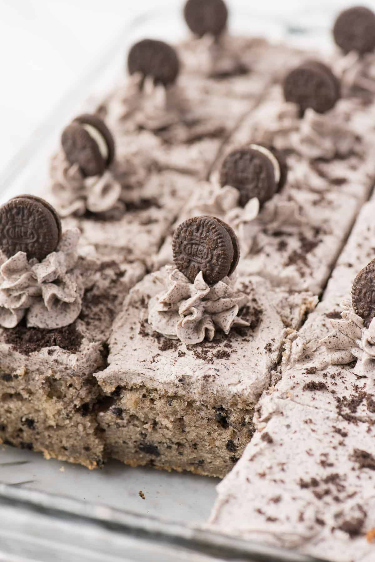 oreo cake cut into pieces in glass 9x13 inch pan