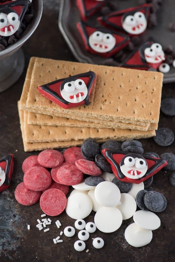 A fun halloween treat to make for any halloween party - Vampire Treats! Made using graham crackers, candy melts and a few other supplies! Plus 10 other halloween treats to serve with your vampires!