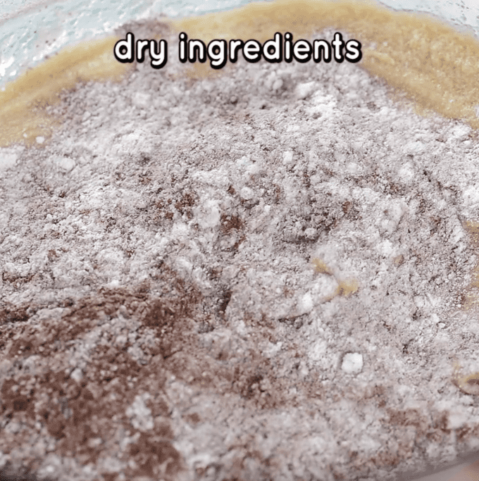 dry ingredients being added to cookie dough