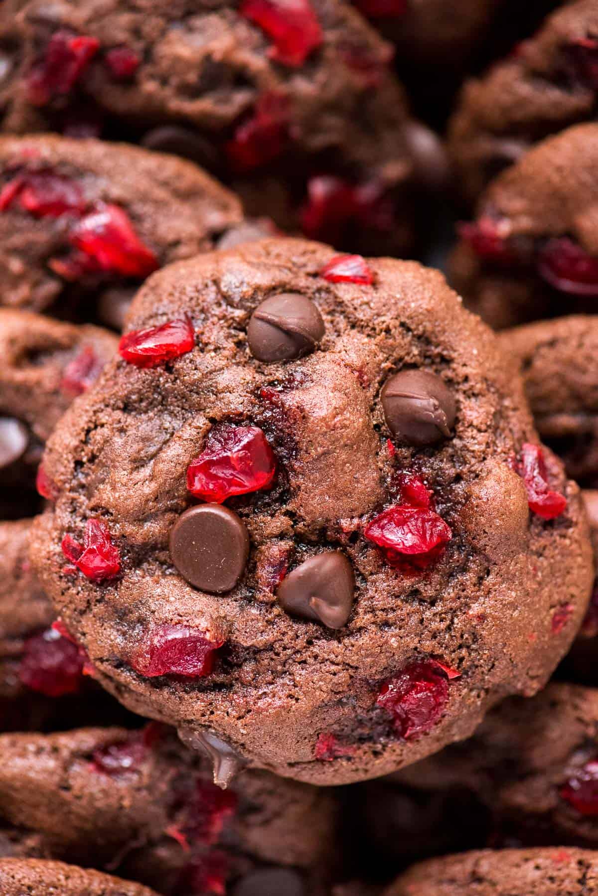 black forest cookies with maraschino cherries and chocolate chips on white background 