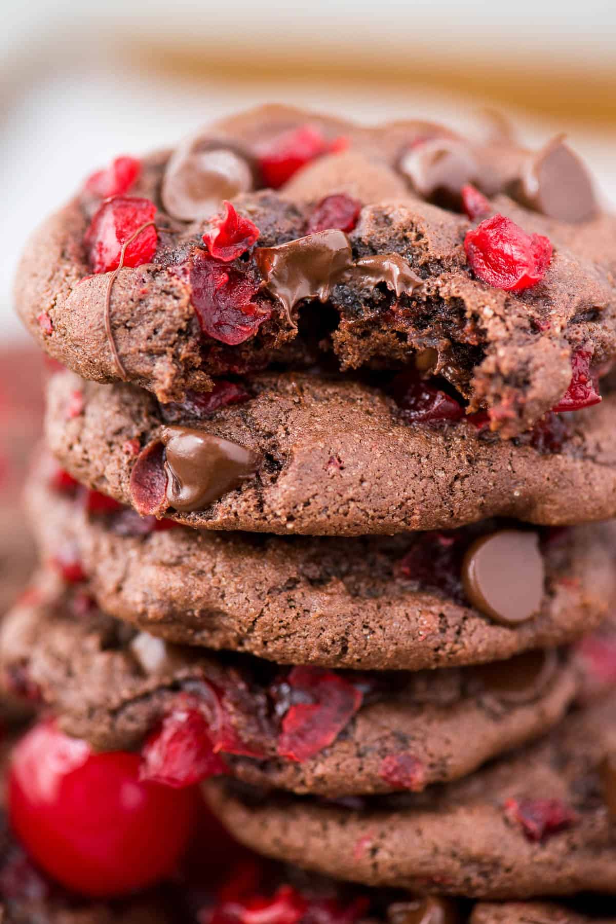 black forest cookies with maraschino cherries and chocolate chips with bite taken out