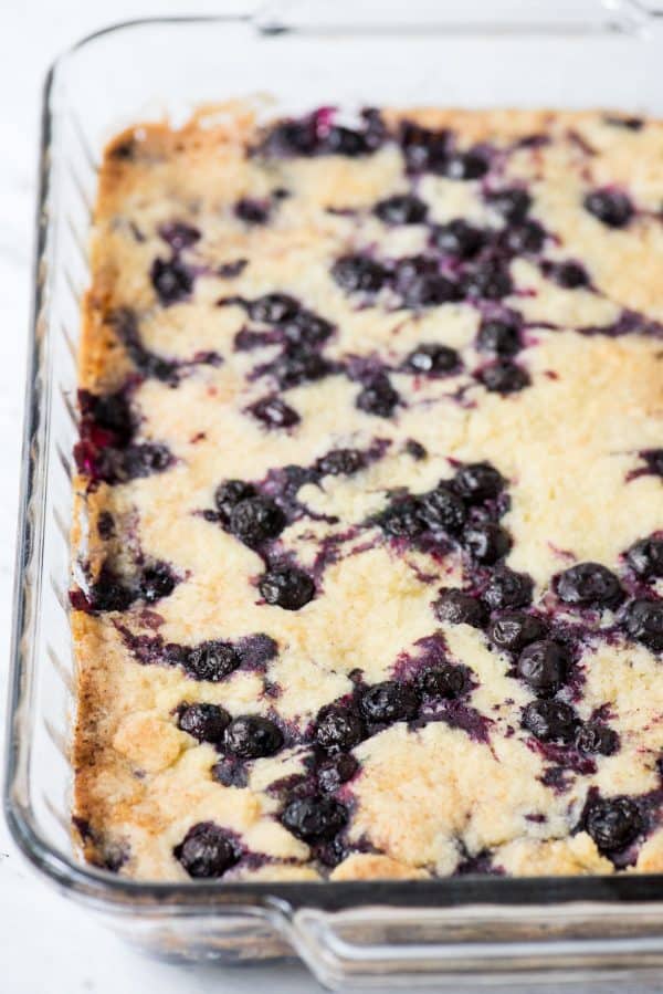lemon blueberry dump cake in glass 9x13 inch pan