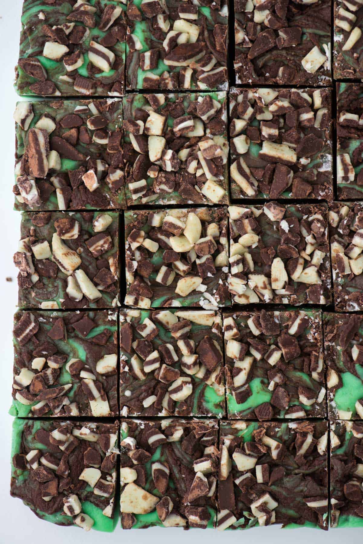 slab of mint chocolate fudge cut into squares