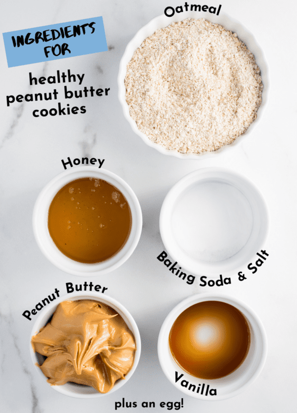 ingredients for healthy peanut butter cookies on white background