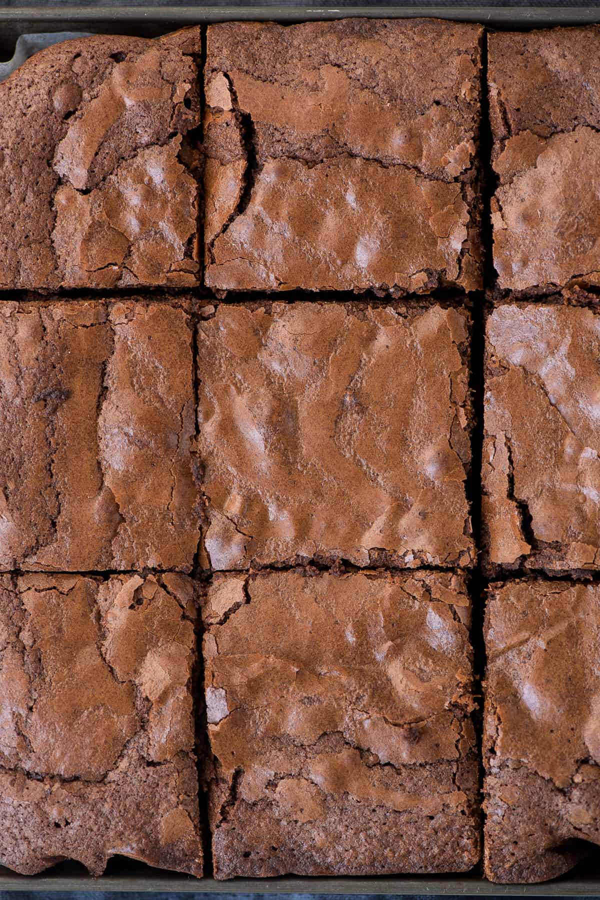 brownies cut into squares in baking pan