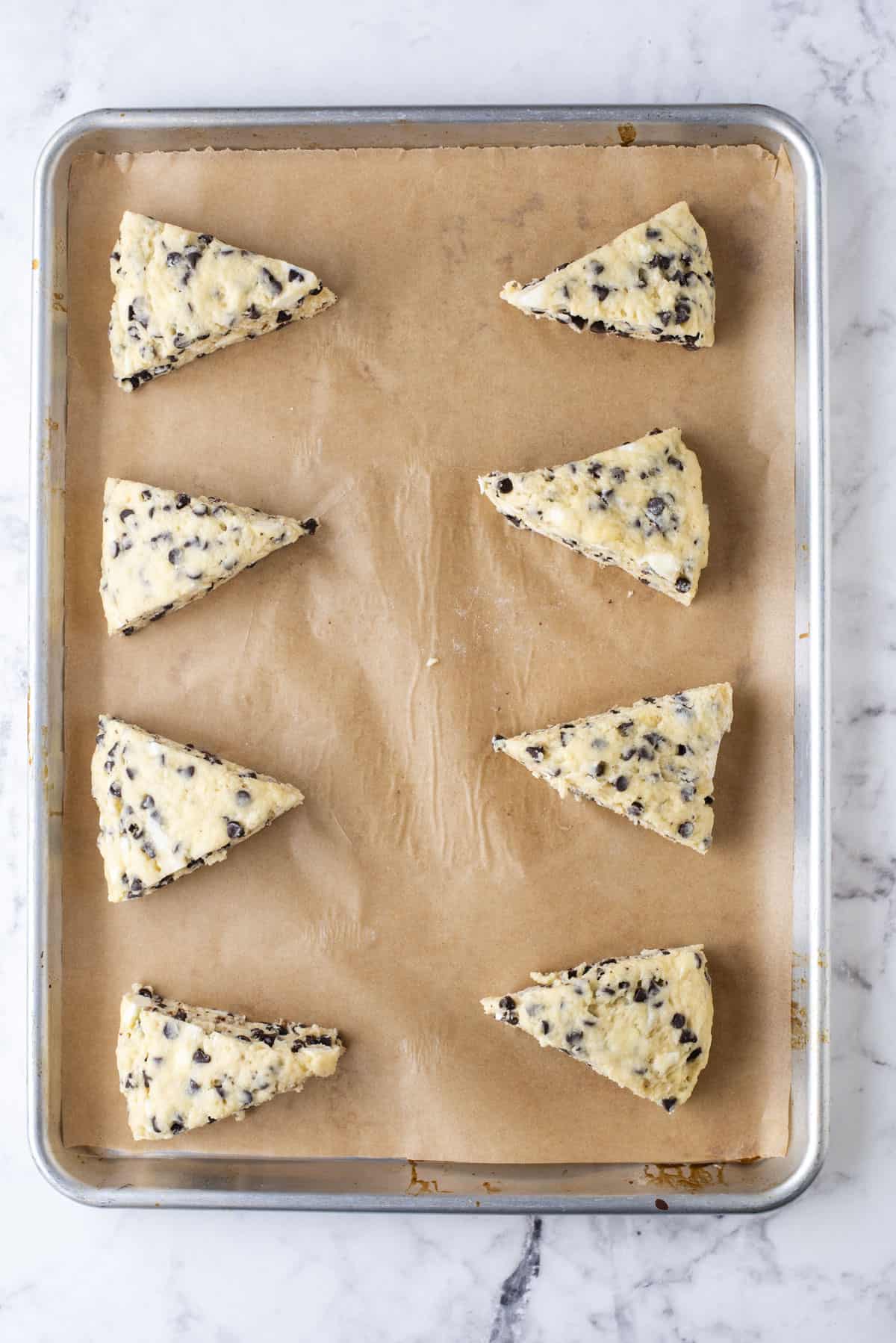8 chocolate chip scones on baking sheet