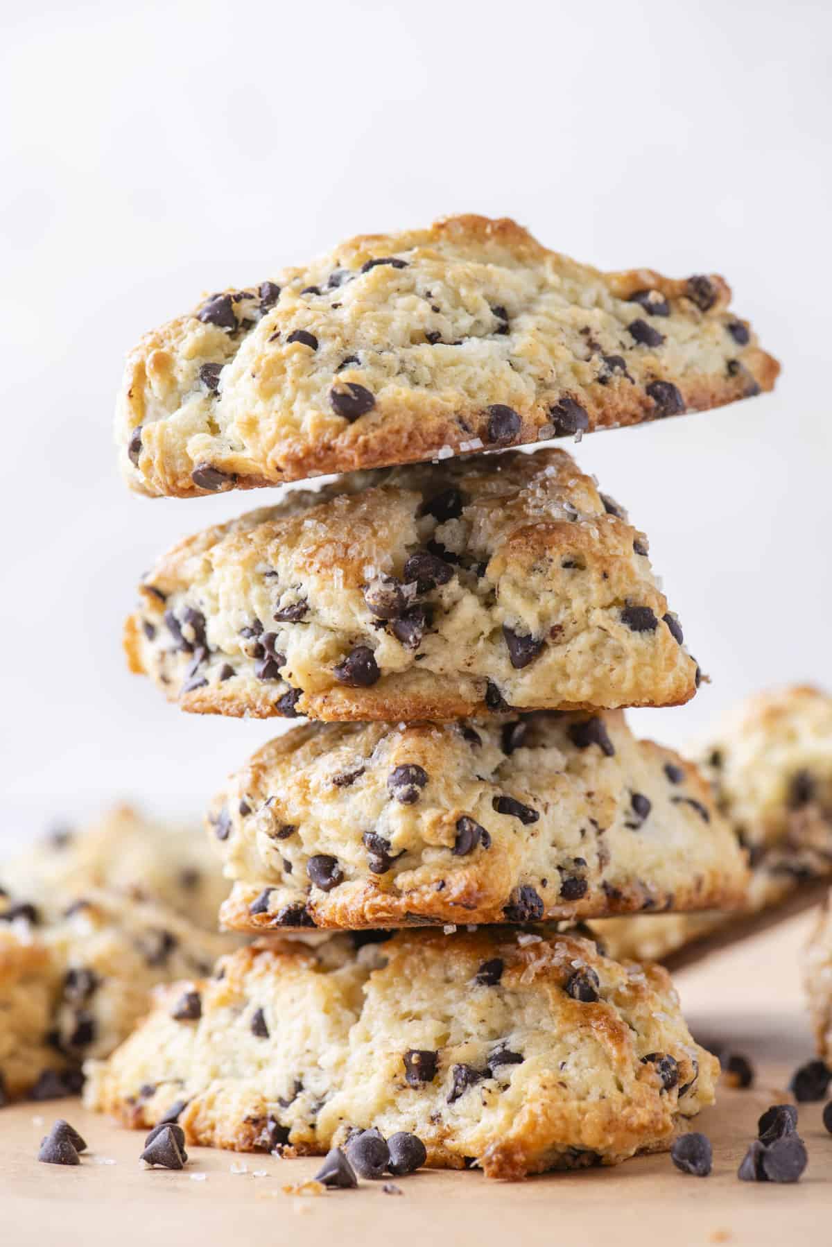4 chocolate chip scones stacked on top of each other in a tower