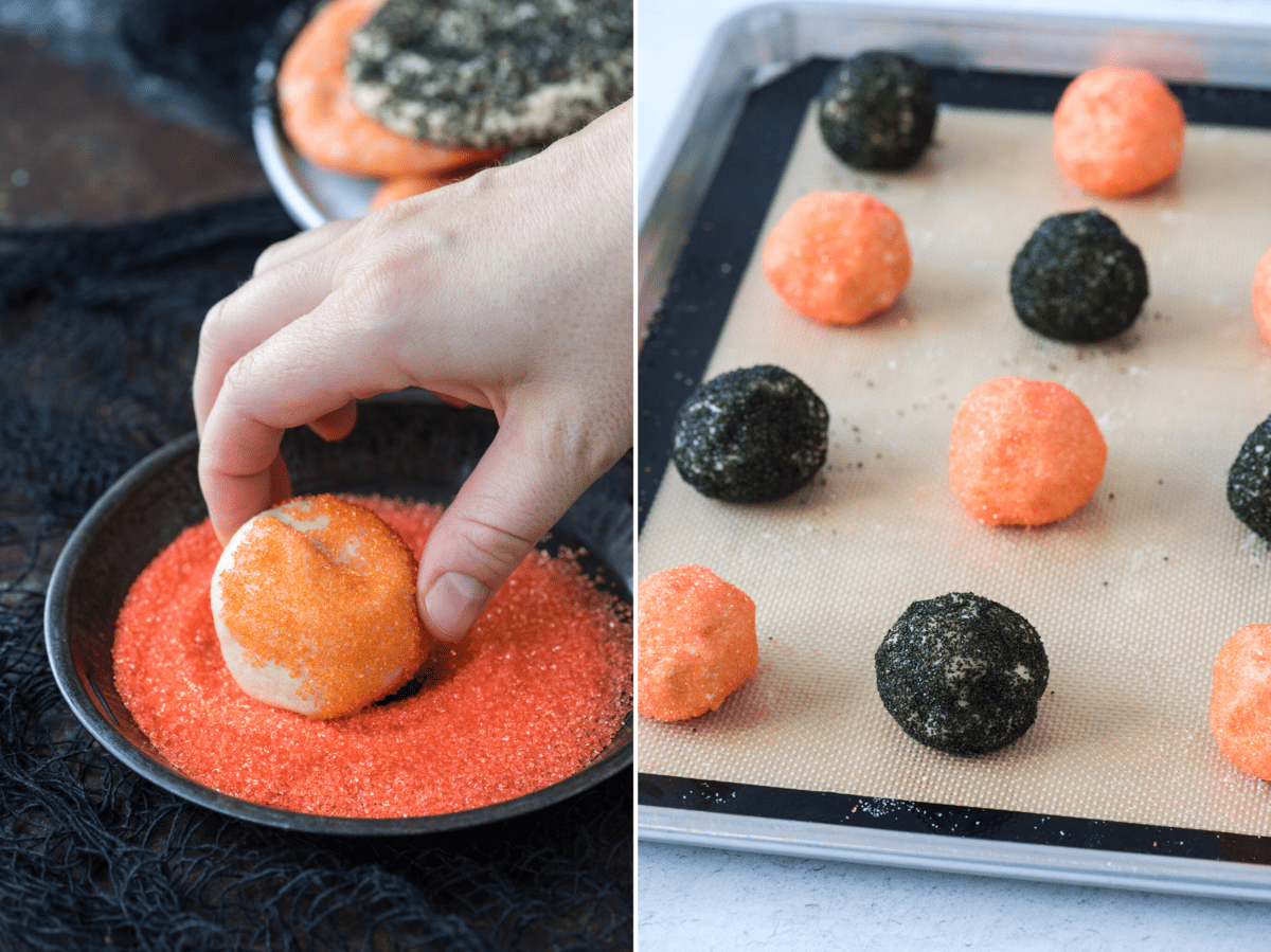 rolling sugar cookie ball in orange sanding sugar and orange and black cookie dough balls on baking sheet lined with a silicone baking mat