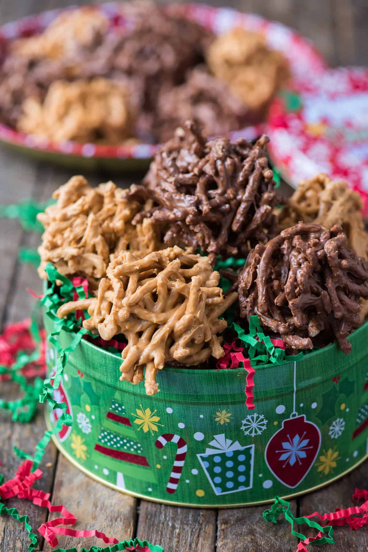 haystack cookies arranged in green christmas cookie tin