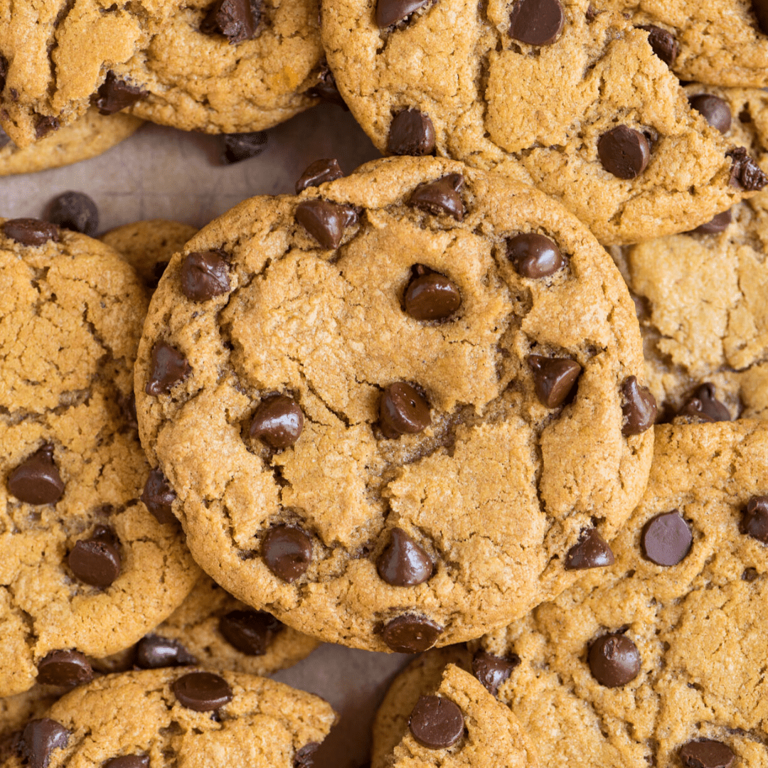 Closeup of pile of pumpkin chocolate chip cookies