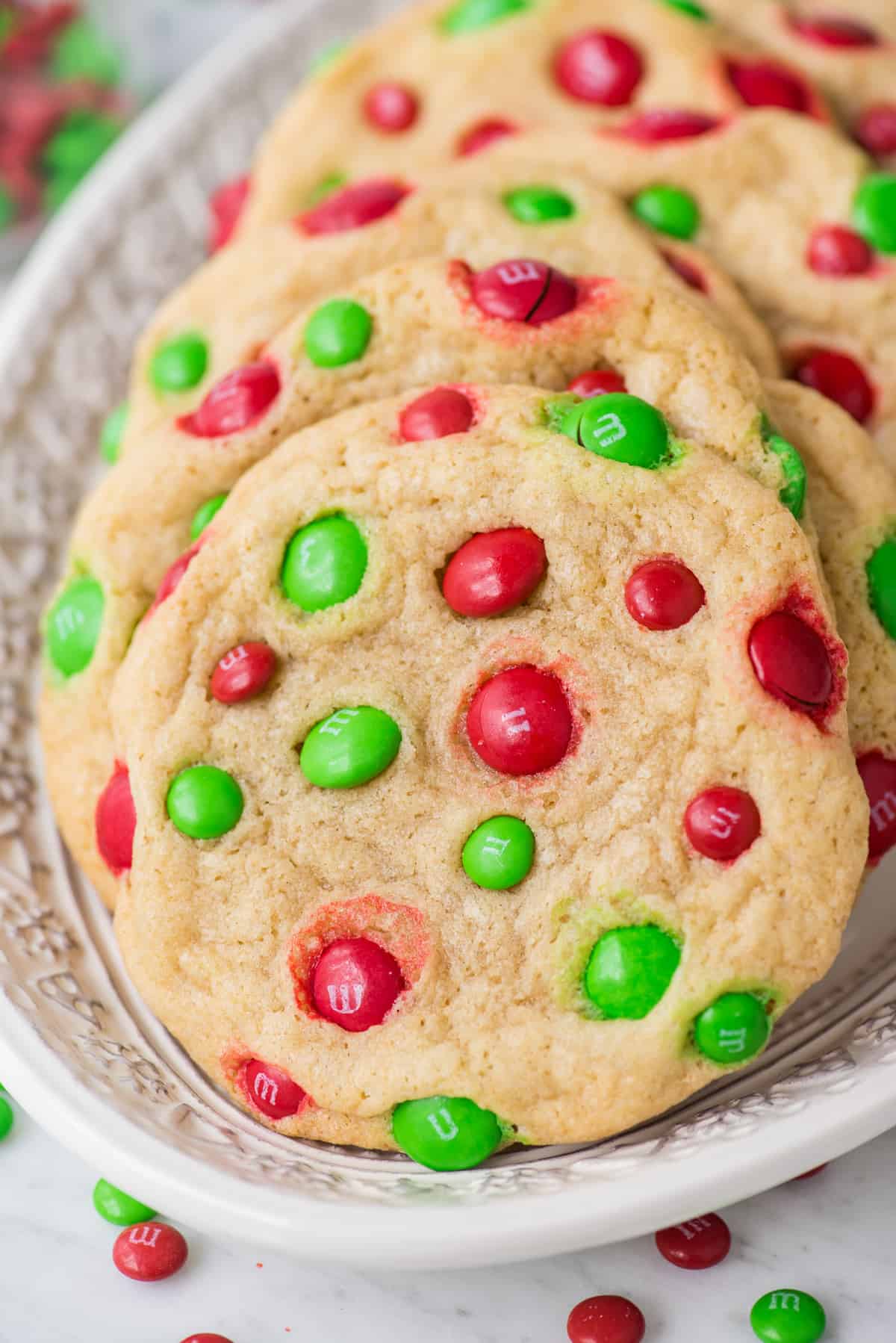 christmas M&M cookies on white christmas platter