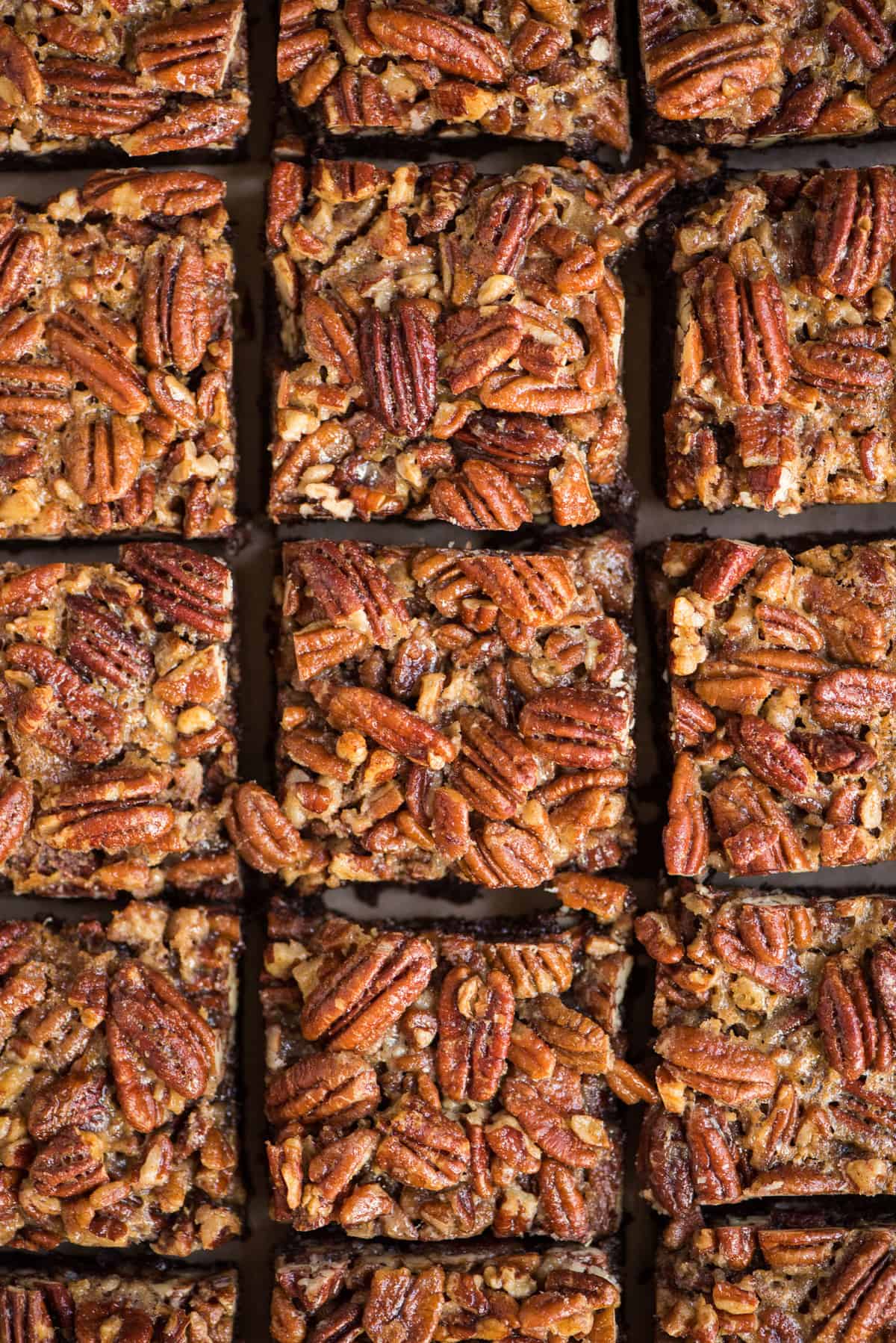 pecan pie brownies cut into squares and arranged in a grid