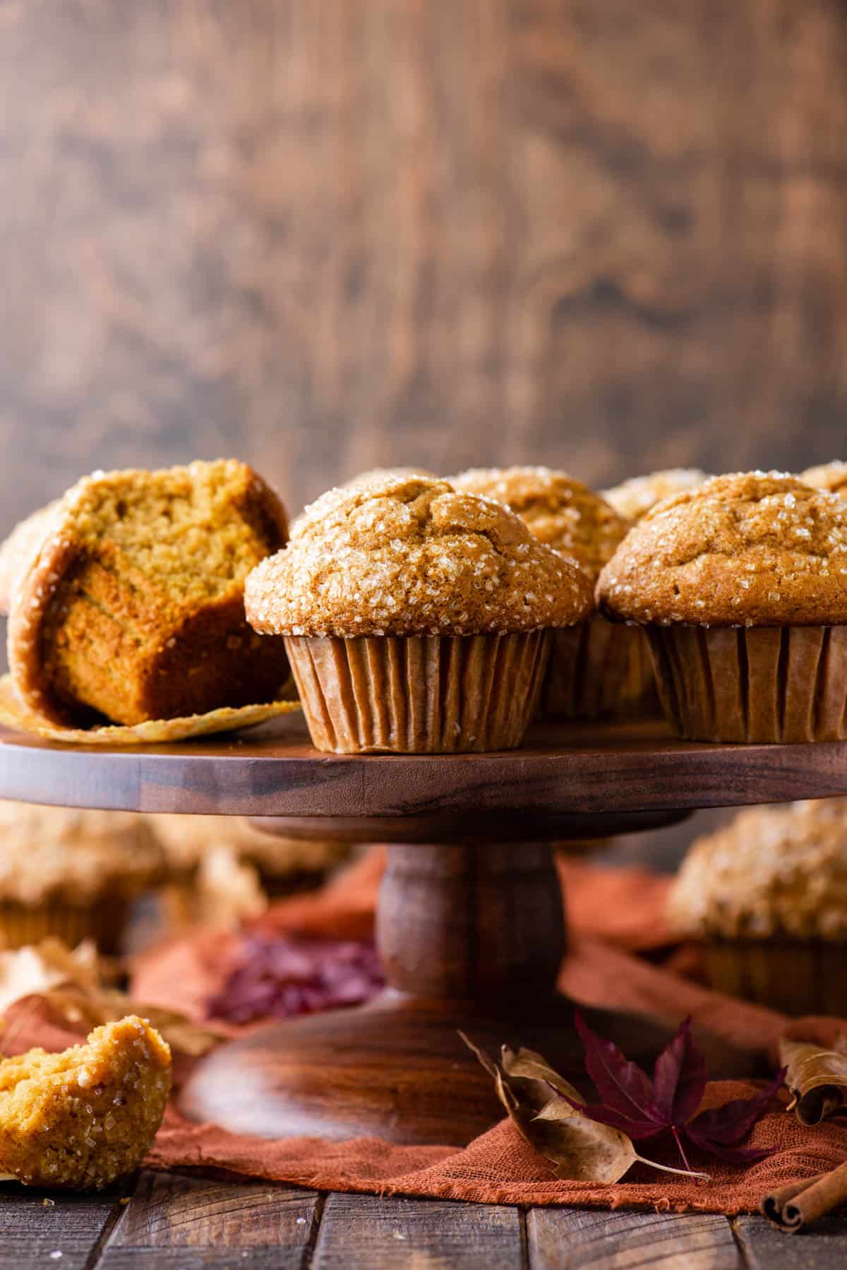 muffins displayed on wooden cake stand