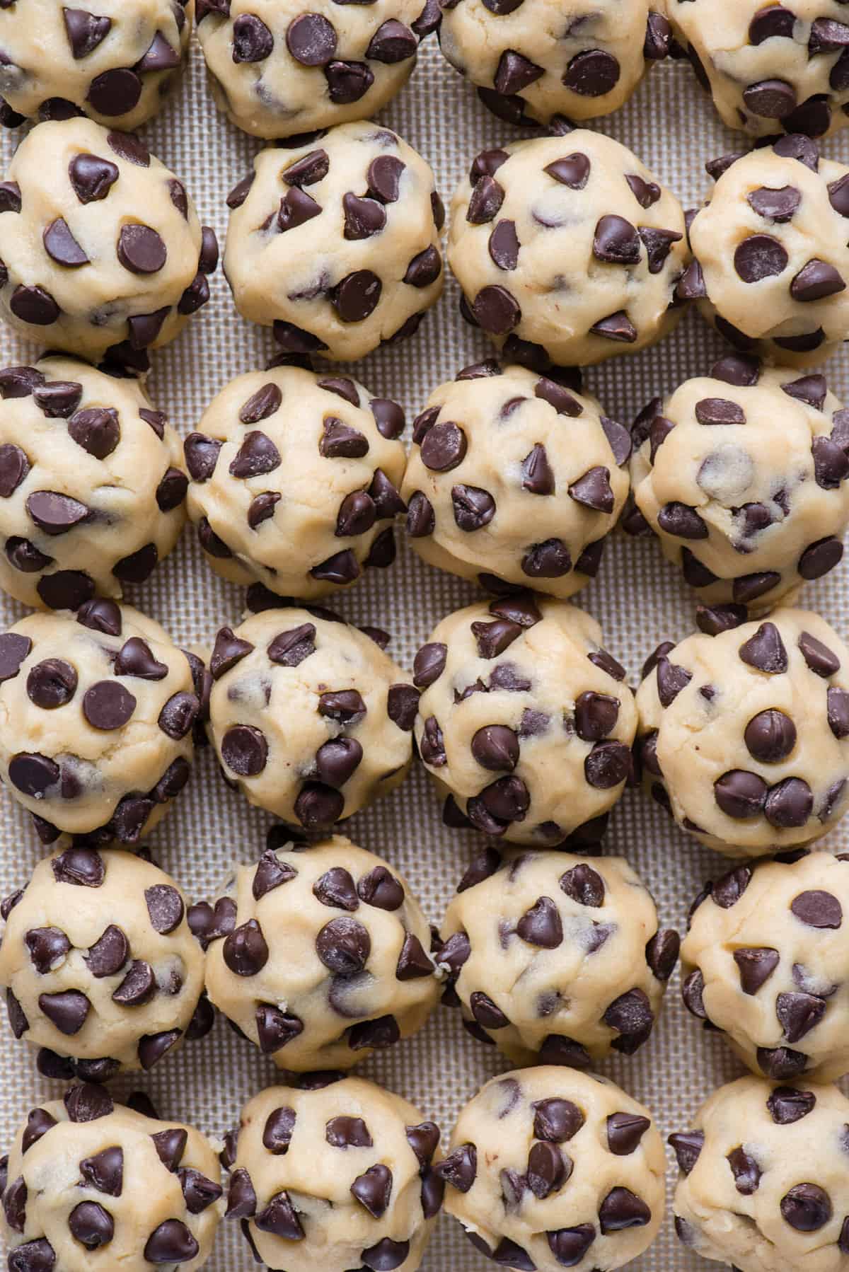 chocolate chip cookie dough balls arranged in a grid pattern