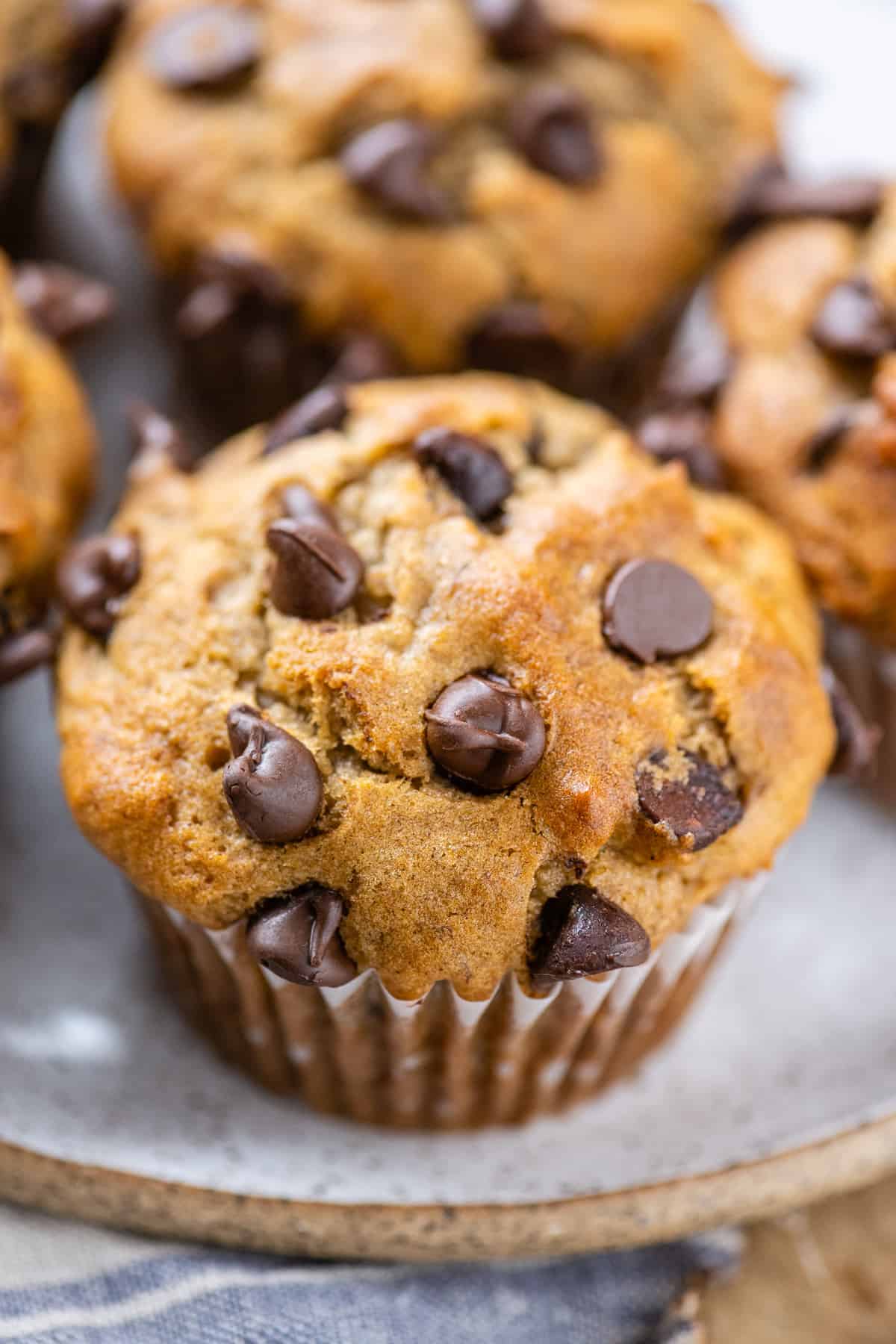banana muffins with chocolate chips on white plate