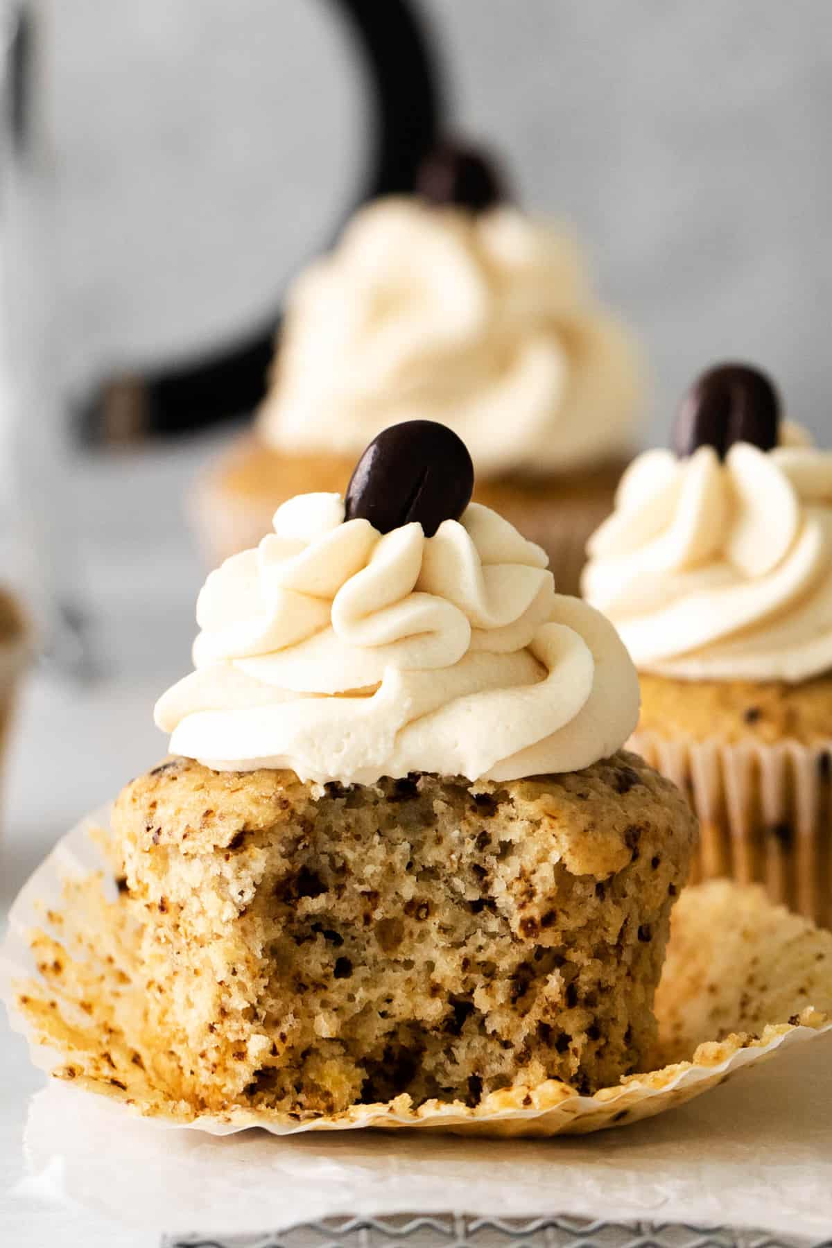 mocha cupcake with bite removed  