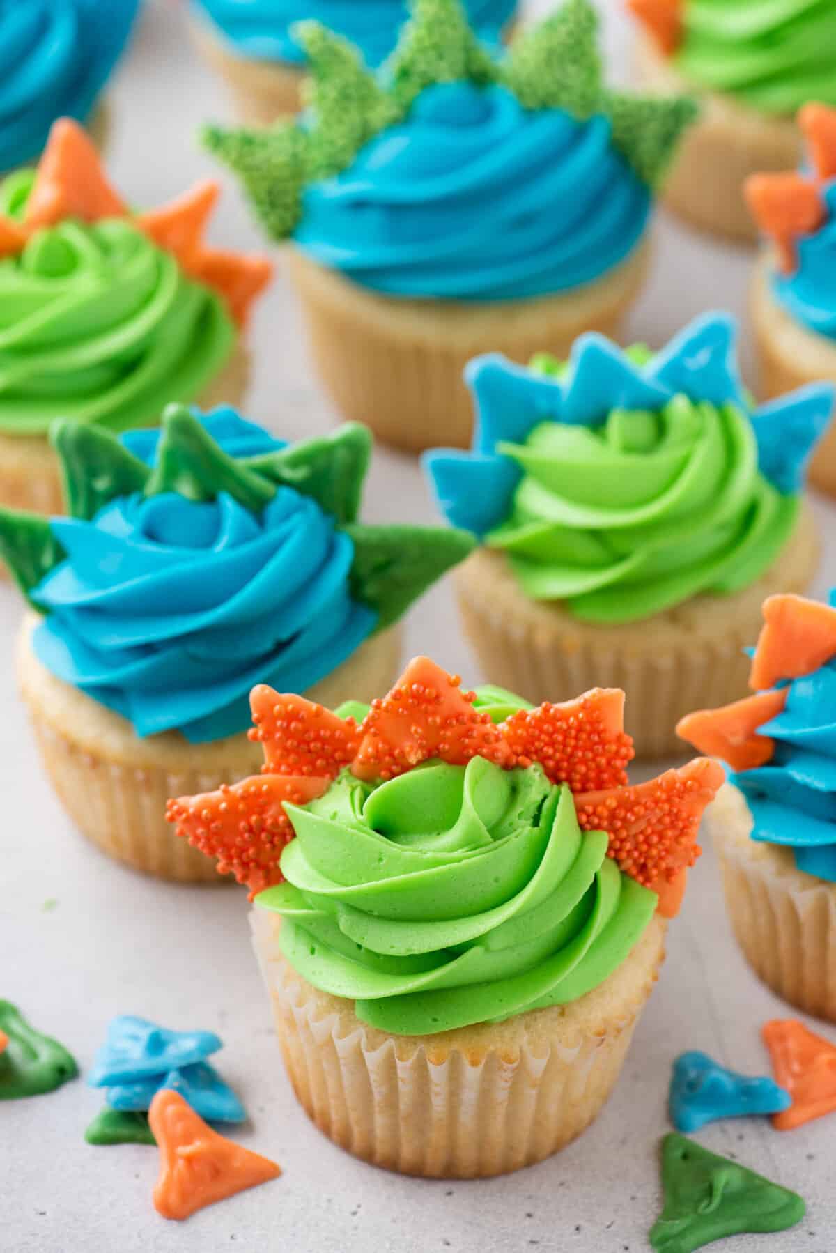 Dinosaur cupcakes topped with almond bark spikes
