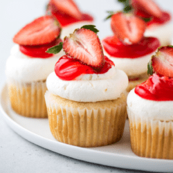 Closeup of strawberry shortcake cupcakes on platter