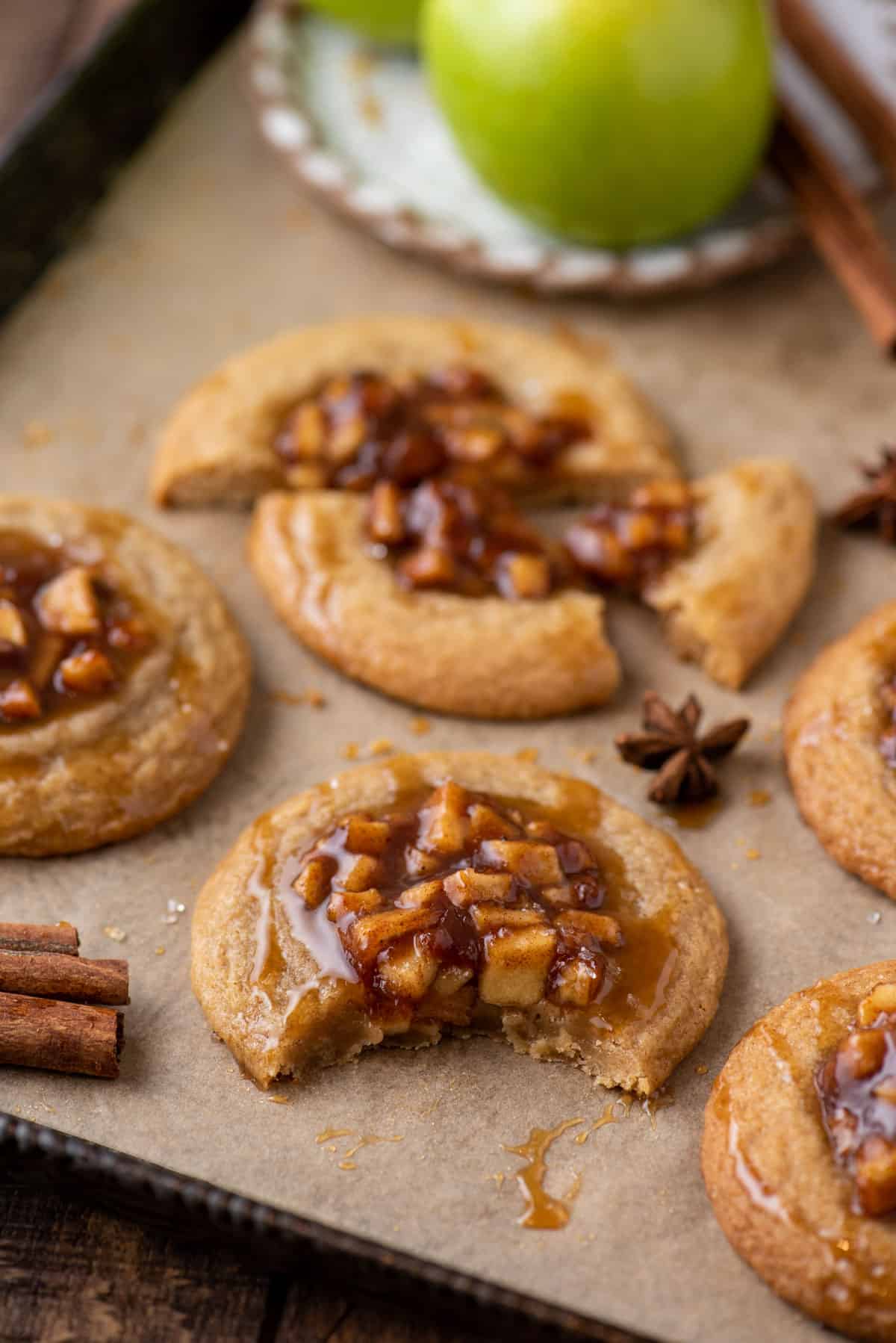 These Apple Pie Cookies are tender, chewy, and the perfect way to use fresh fall apples! A soft cinnamon spiced cookie is topped with homemade apple pie filling and then drizzled with gooey caramel. So good!