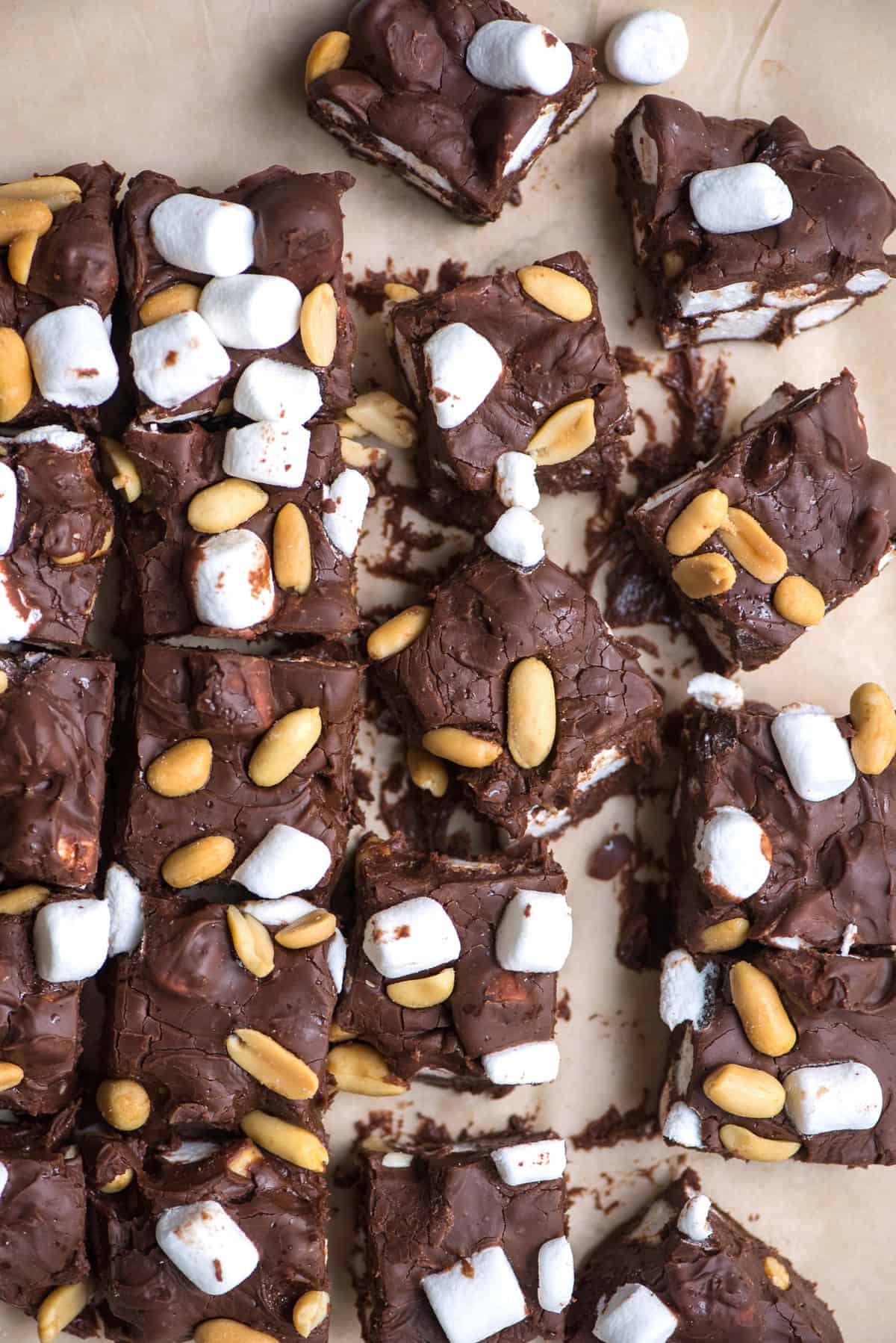 rocky road fudge cut into squares arranged on brown parchment paper