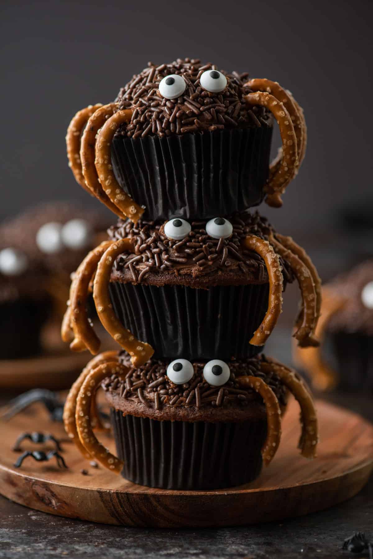 Three spider cupcakes stacked on each other