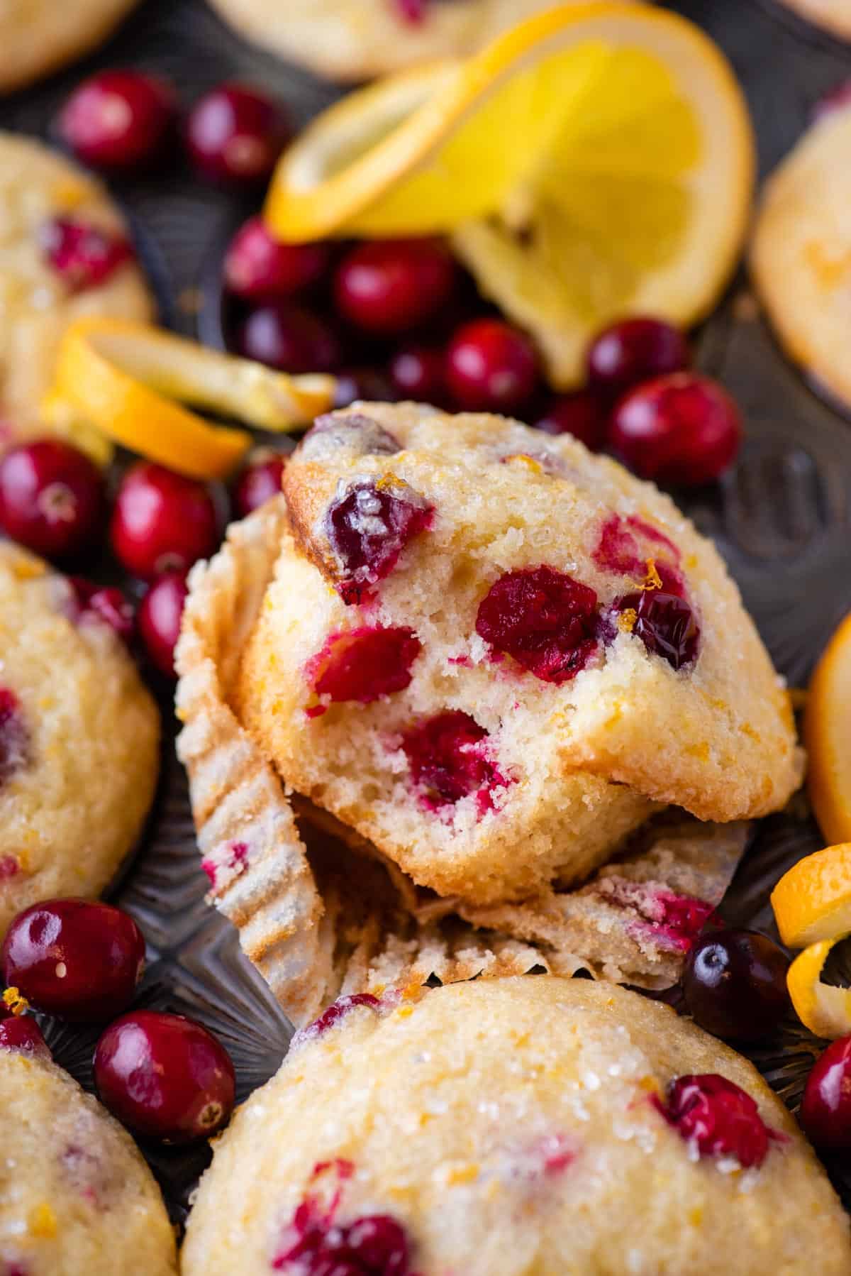 Close up of a cranberry muffin with a bite missing