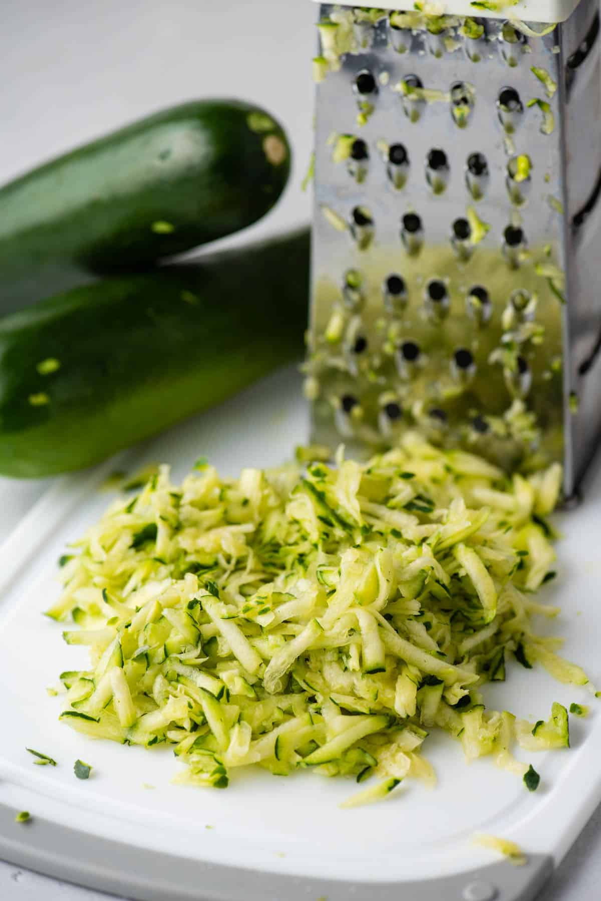 Grated zucchini on a cutting board