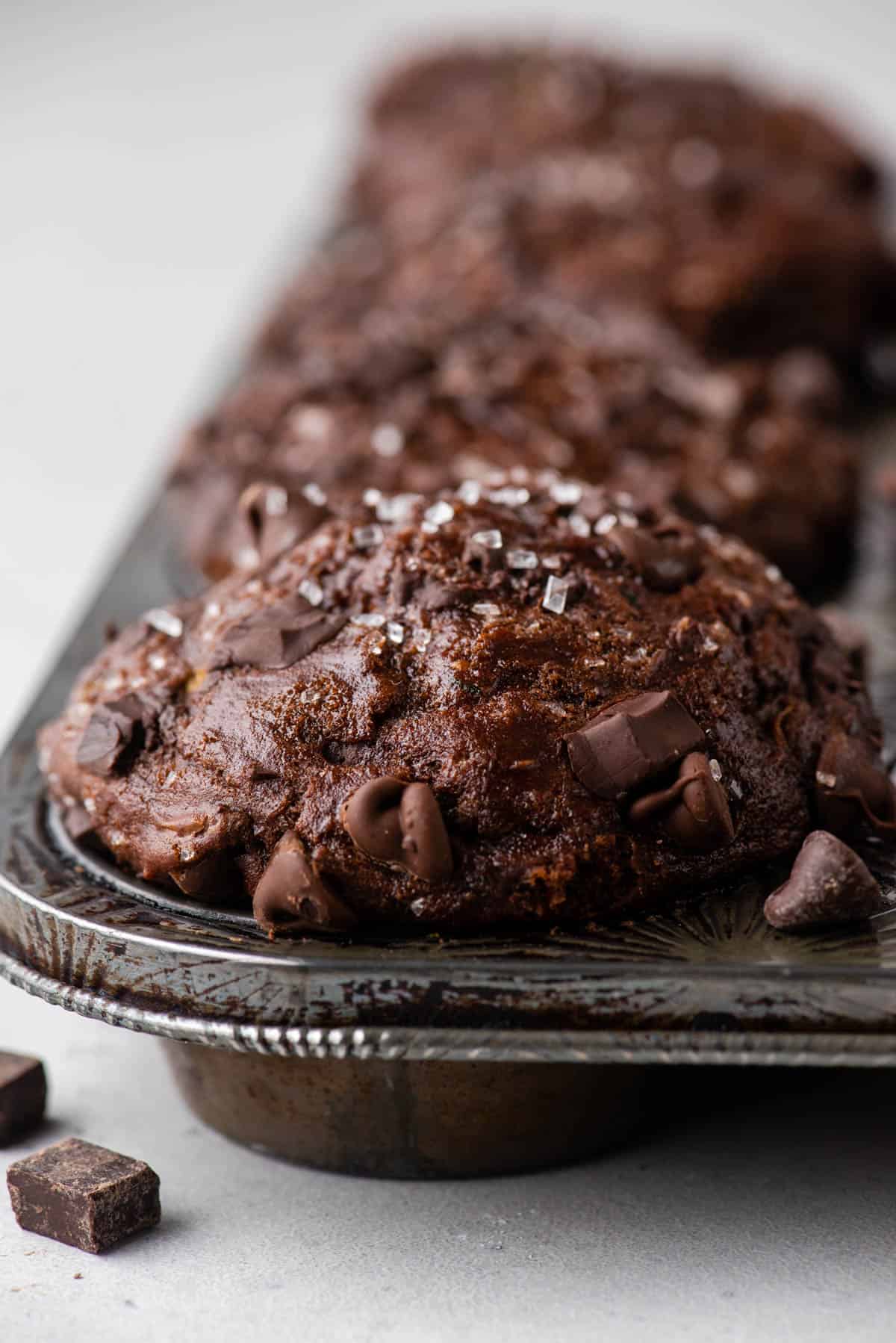Chocolate zucchini muffins in the muffin pan