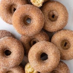 Cinnamon Sugar Donuts arranged on a white background